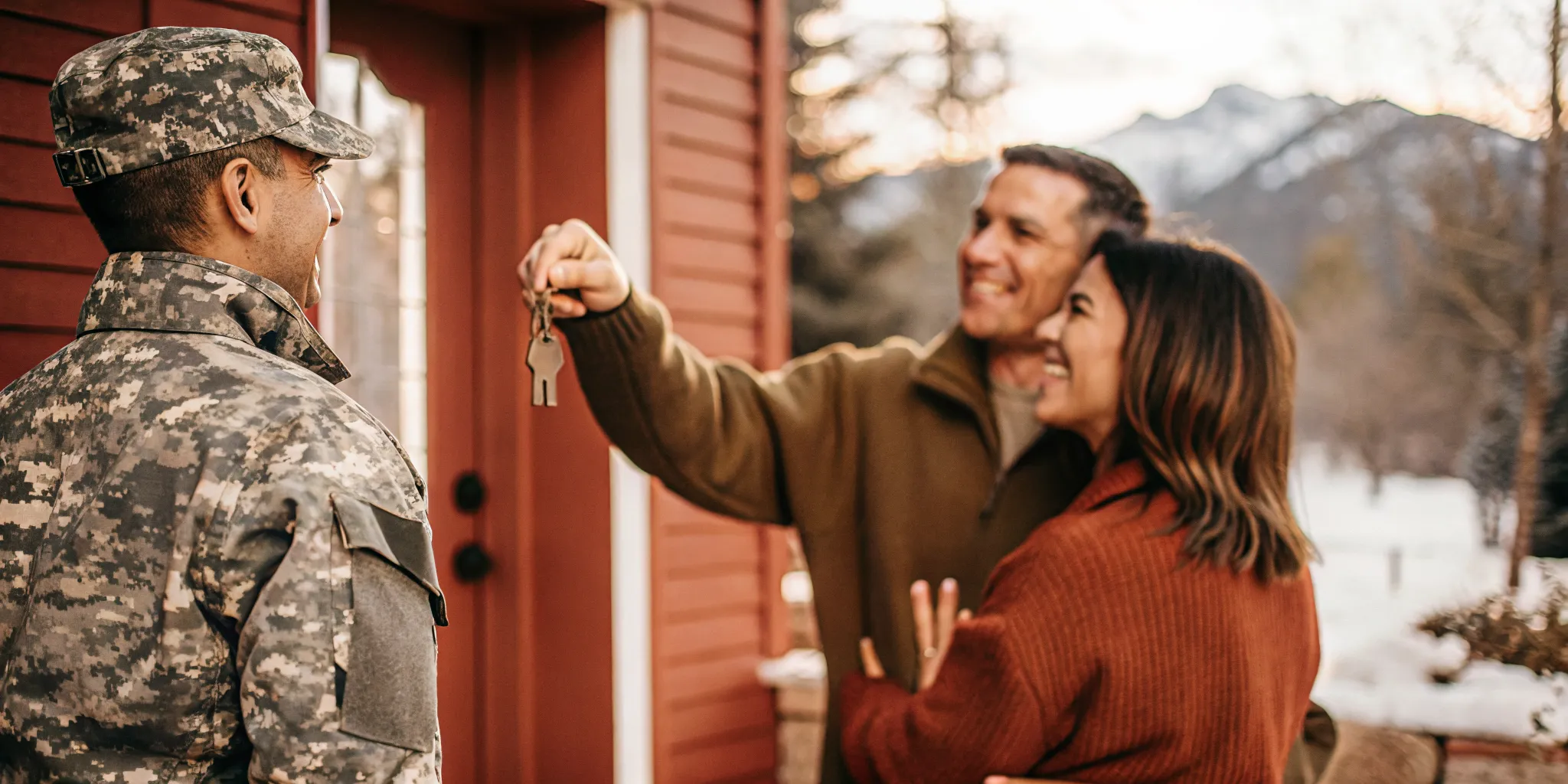 Military veteran family receiving house keys from loan officer outside Washington home